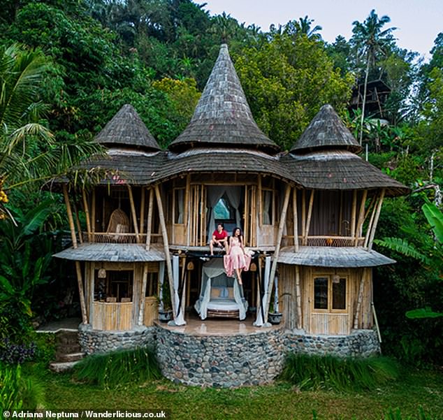 Adriana, who documents her travels on her TikTok and Wanderlicious website, has so far travelled to 44 countries and says she is 'not ready to give [travel] up yet' in the way she has come to know it. Pictured: Adriana and her husband in Bali