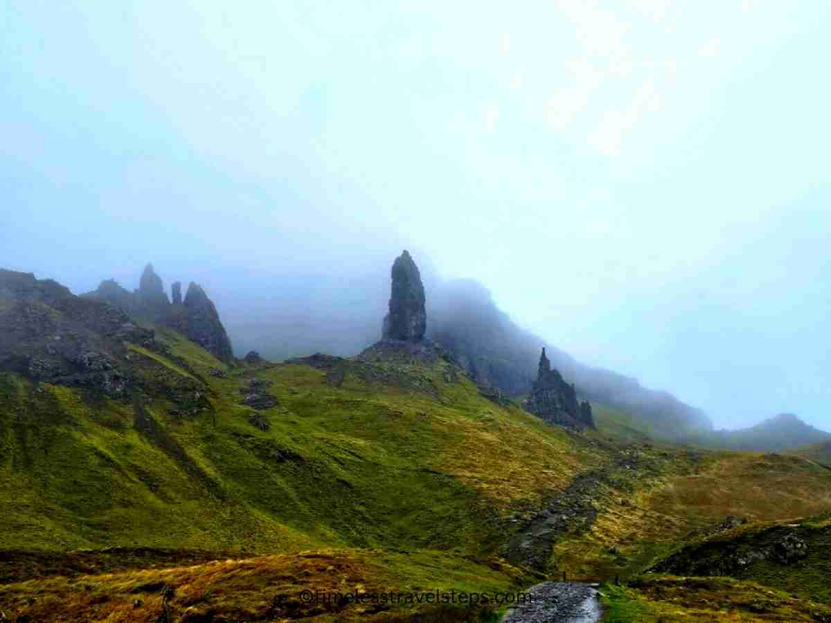 climbing and closer to the Old Man of Storr