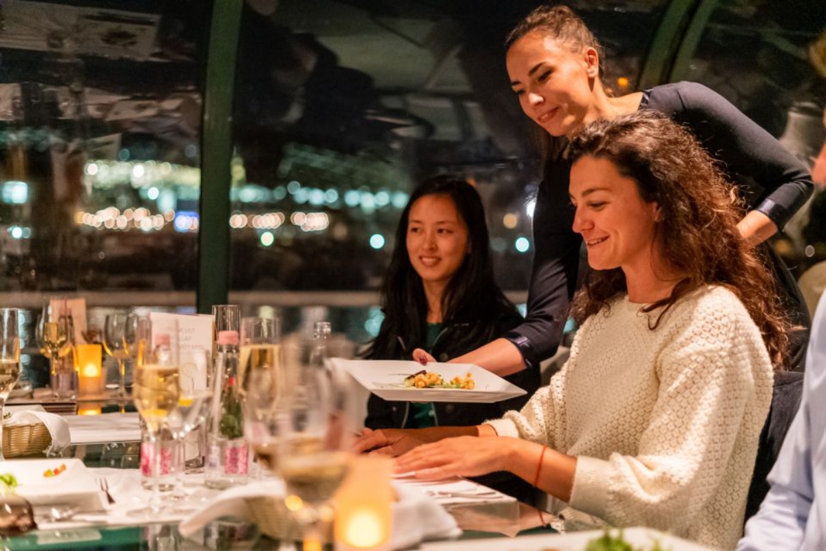 Tourists on a Budapest Candlelit Dinner River Cruise