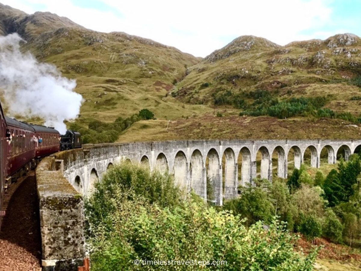 the Hogwarts Express train aka Harry Potter train crossing the Glenfinnan Viaduct, The Highland