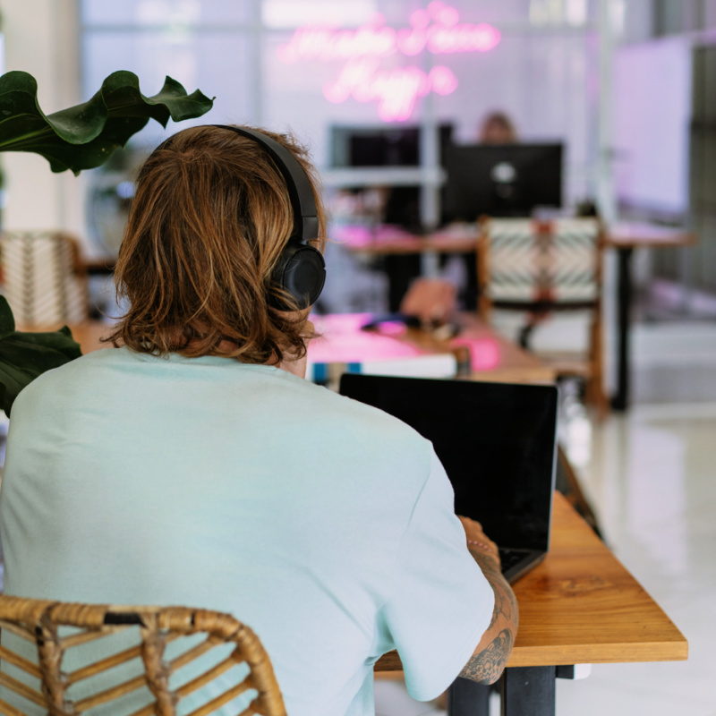 Digital-Nomad-In-Bali-Works-In-Coworking-Office-Space-On-His-Laptop