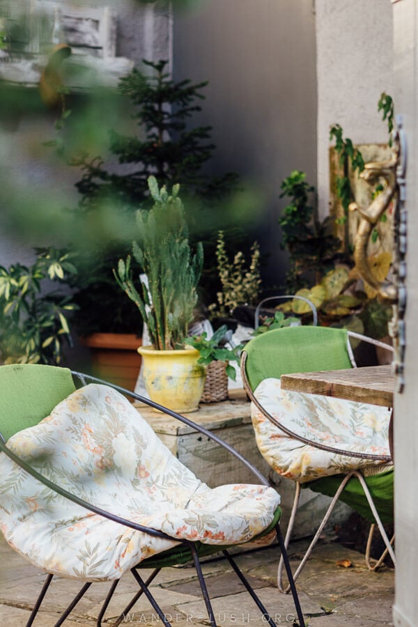 Outdoor chairs and a table at a cafe.