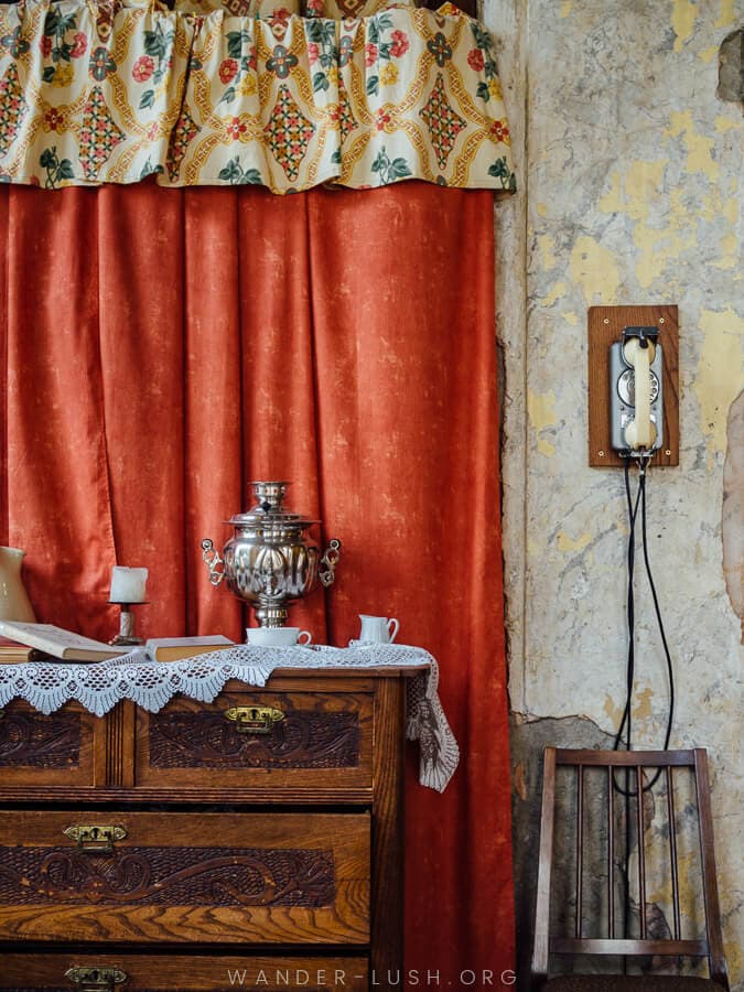 A red curtain and silver samovar inside Tea House Fou-Fou in Kutaisi.