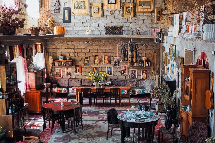 An eclectic restaurant, Lia Deida, near Kutaisi in Argveta with antiques and paintings on the walls.