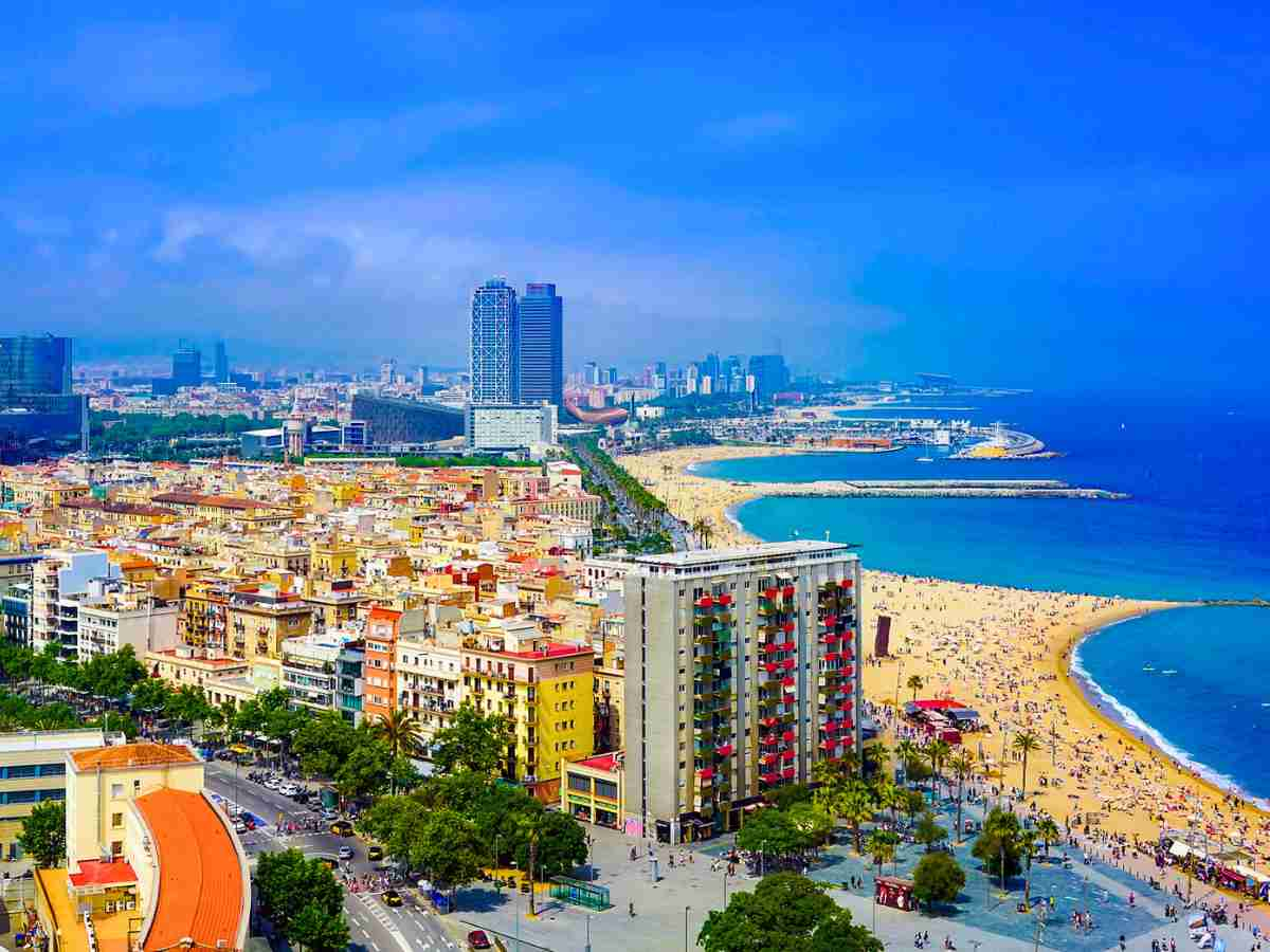 beautiful colouful image of  Barcelona's coastline with high rise buildings and accommodations overlooking the sea