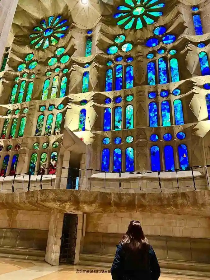 the colourful glass windows with the sunlight streaming through at La Sagrada Familia | just I, Georgina was totally in awe of the sight, captured by my fabulous daughter.