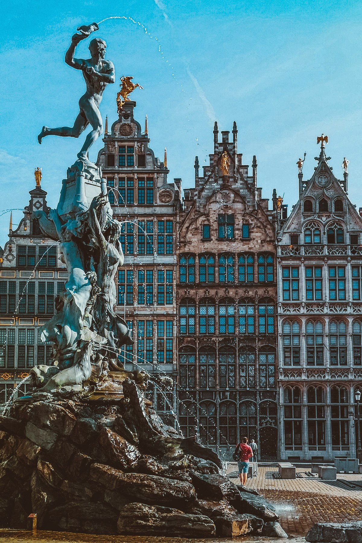 The famous tall Brabo Fountain in the ornate old market square in Antwerp, Belgium. 