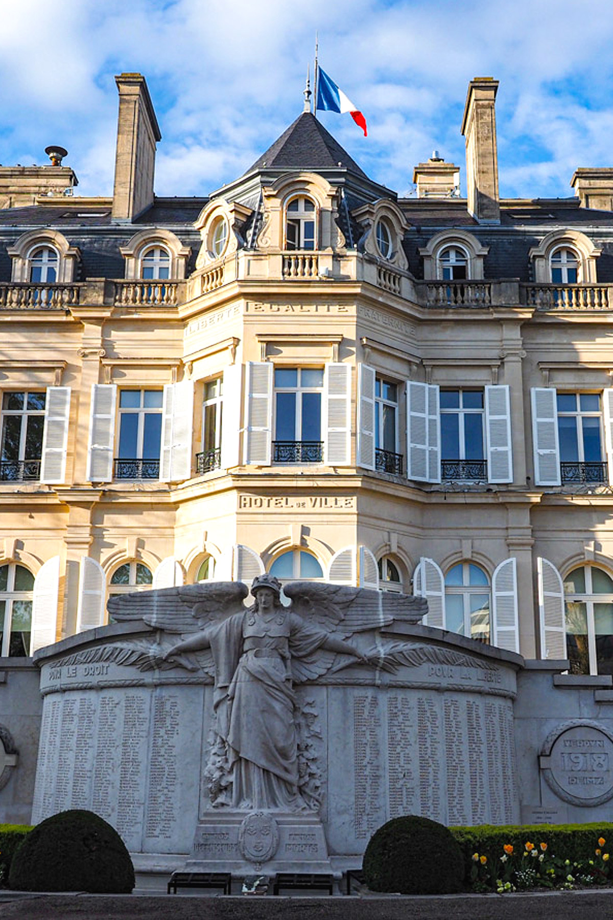 The majestic town hall on the Avenue de Champagne in Epernay is one of the best day trips from Paris.