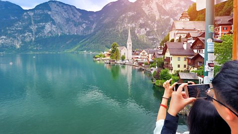 Artorn/Getty Images Hallstatt in Austria gets as many as 10,000 visitors a day during high season (Credit: Artorn/Getty Images)