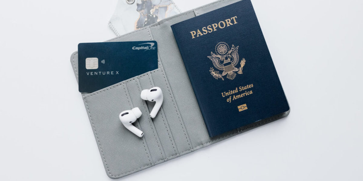 Capital One Venture x in a passport wallet