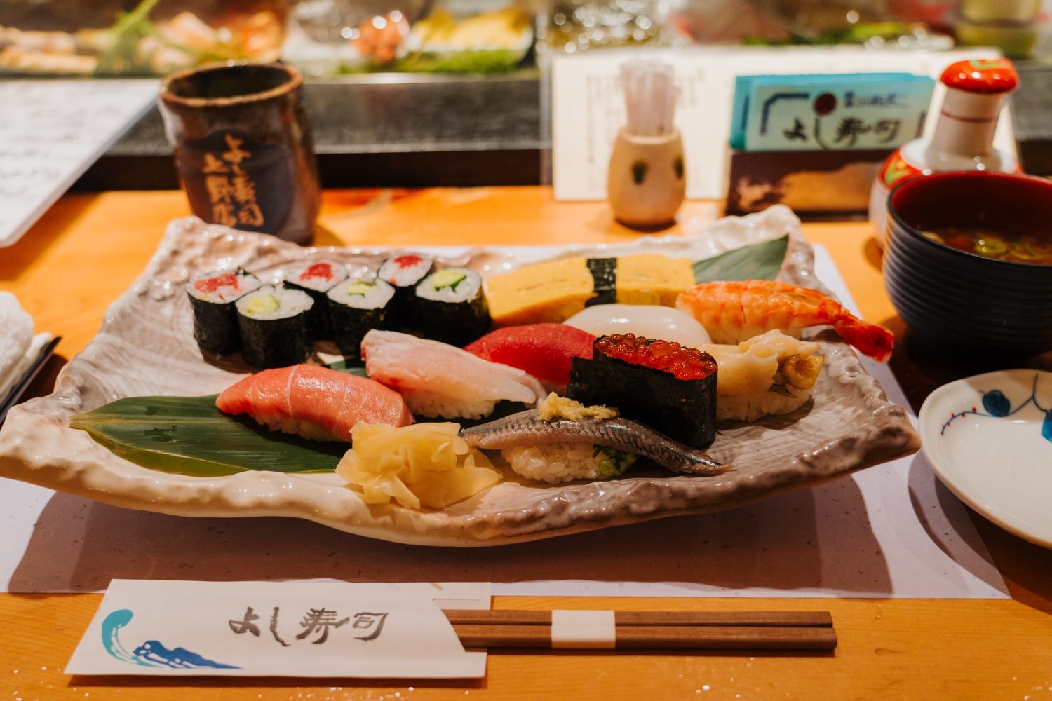 Plate of high-quality Japanese sushi with various nigiri sushi.