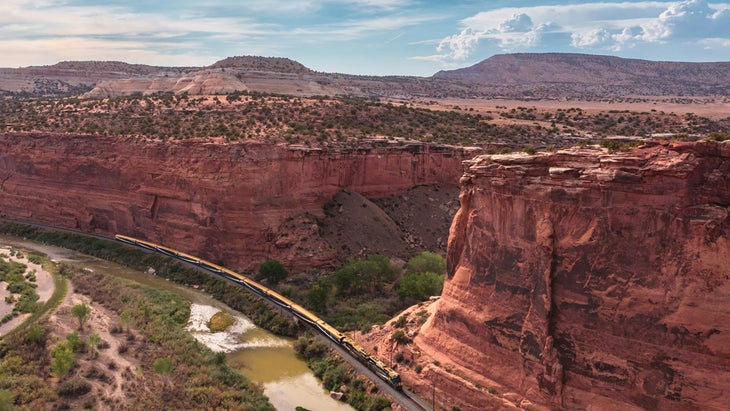 Rocky Mountaineer train passing near Ruby Canyon on the Colorado River