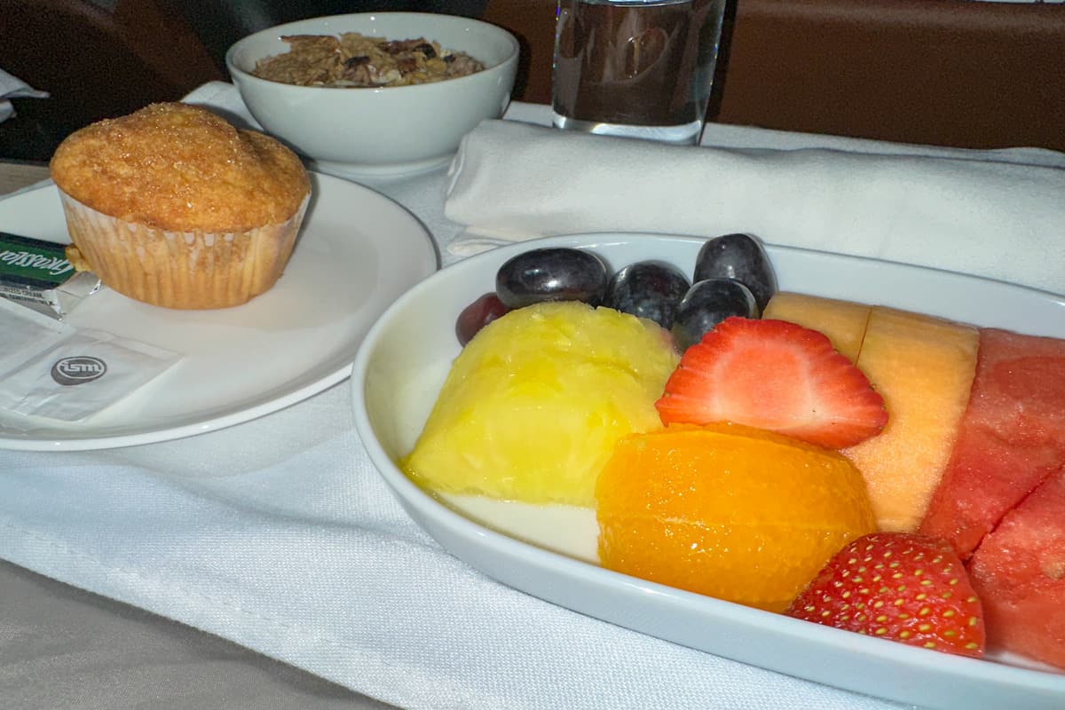 Breakfast of a muffin, oatmeal and fruit