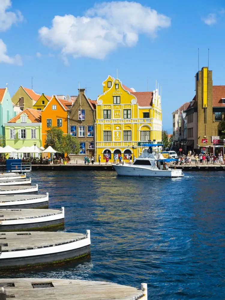 View of colorful houses from harbor in Willemstad — Getty Images