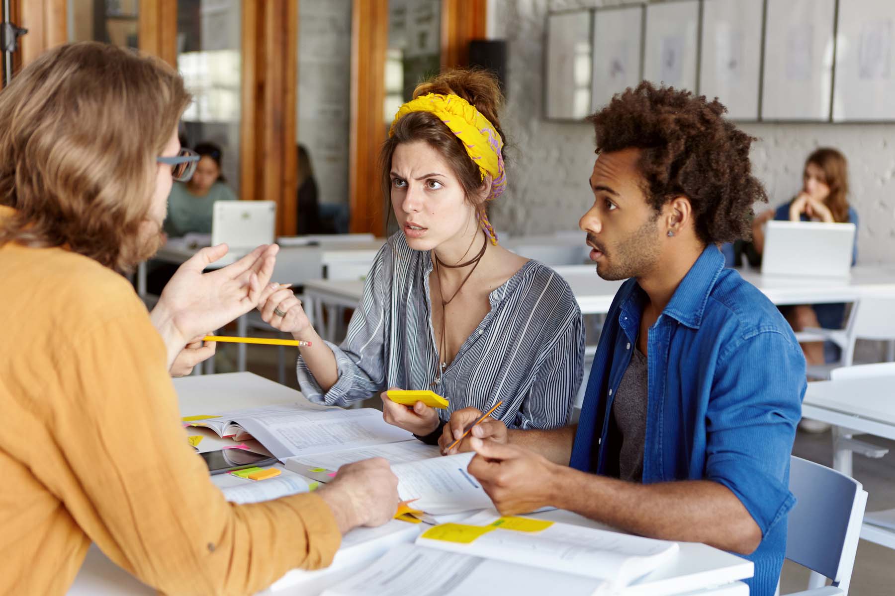 a man and a woman taking a language class