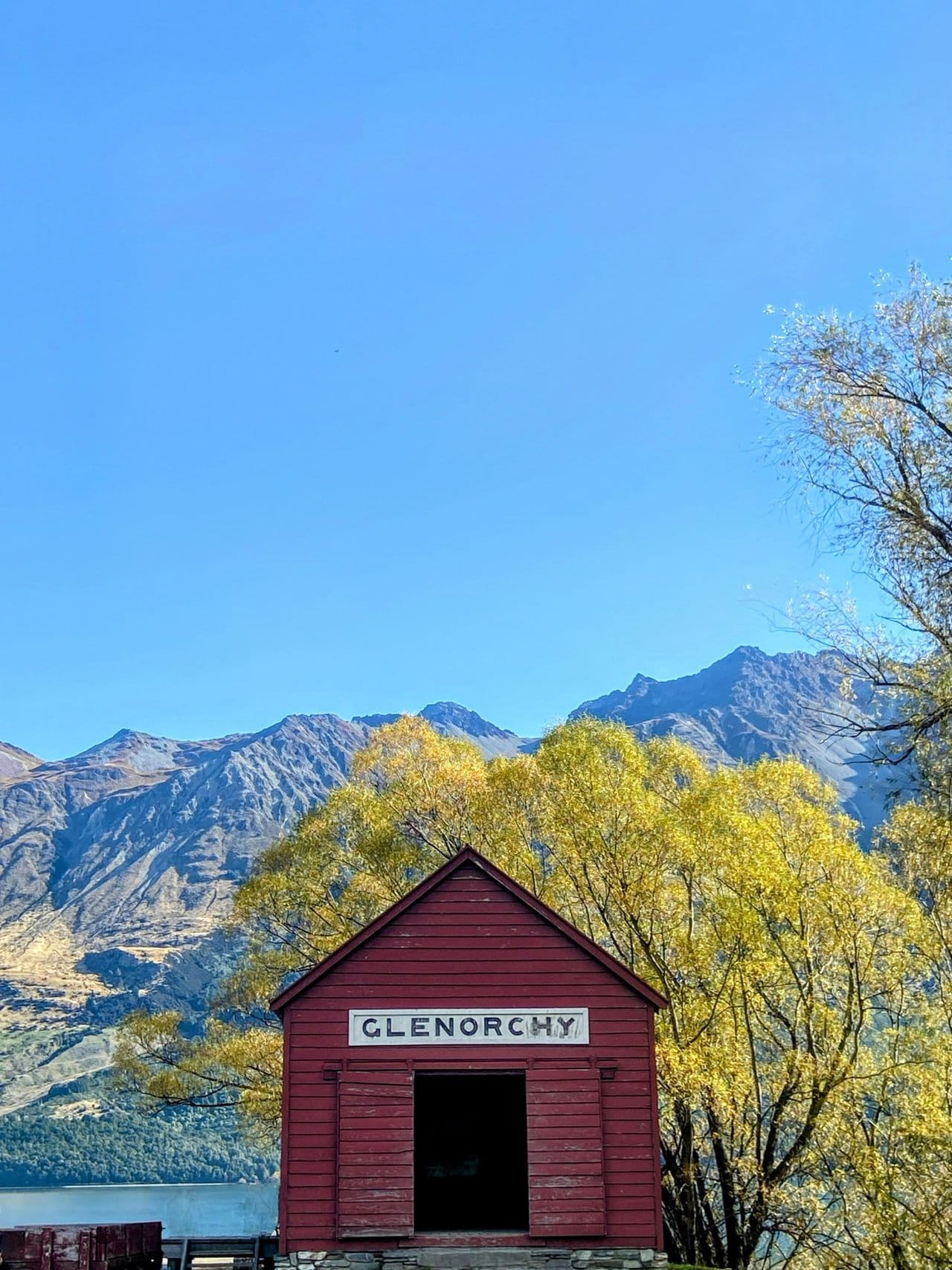 Glenorchy day trip from Queenstown New Zealand, Glenorchy red wharf shed, South Island itinerary