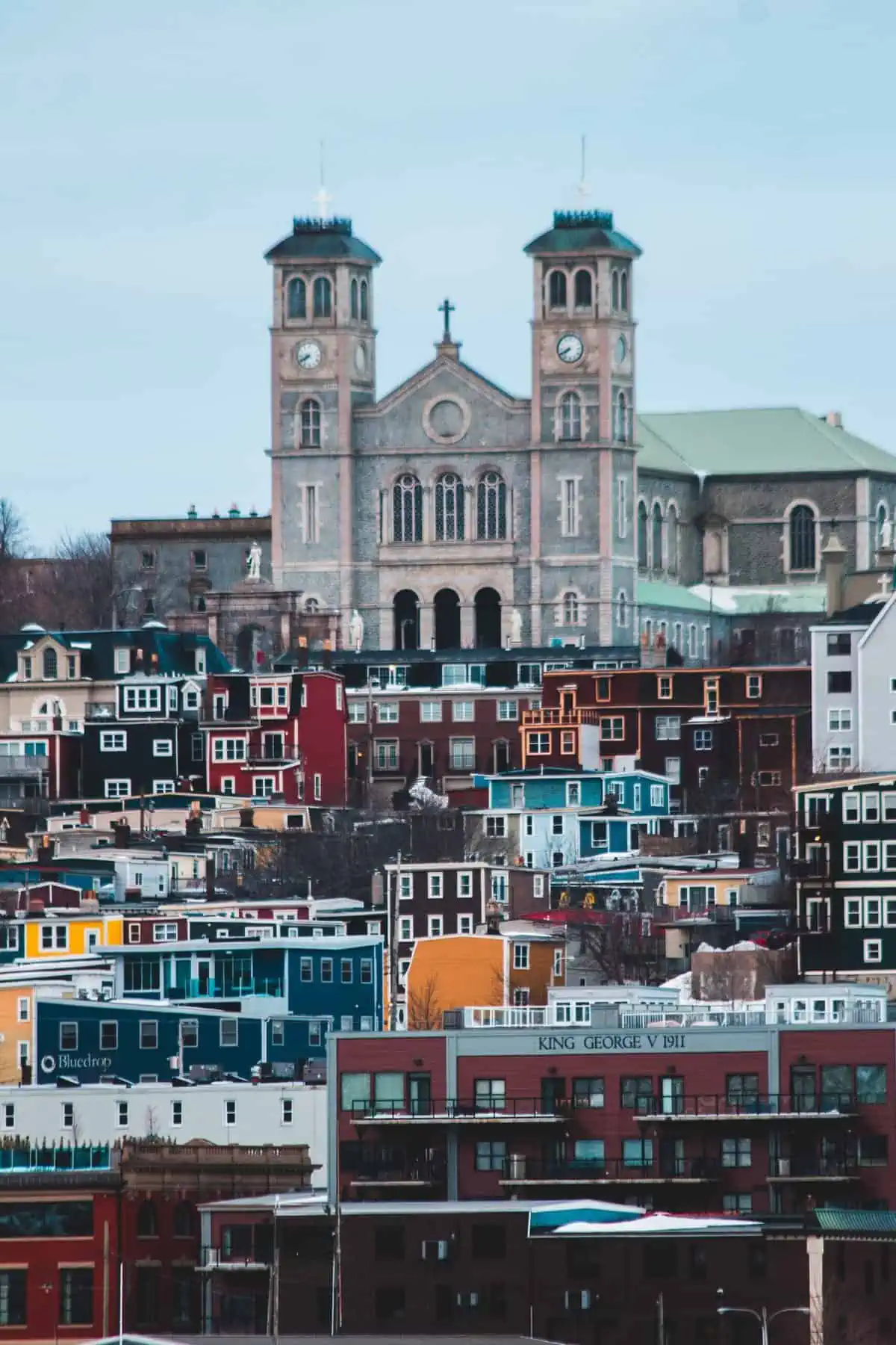 colourful buildings and a tall church in St. John's Newfoundland, Canada