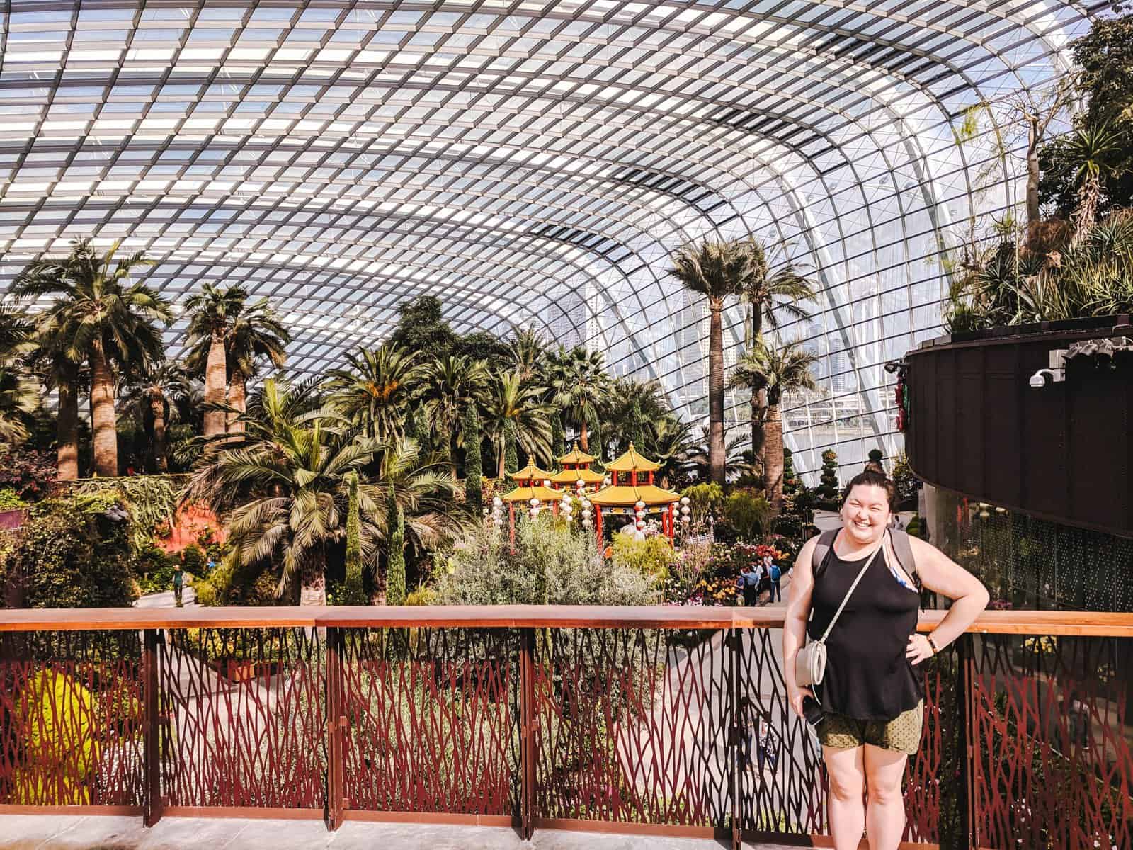 Riana posing for a photo in the Flower Dome at Gardens by the Bay in Singapore