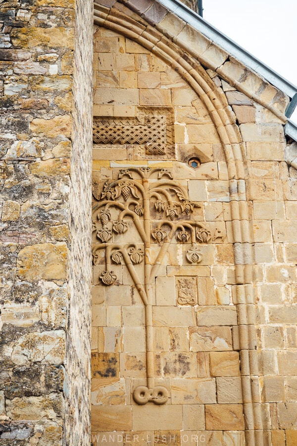 A stone church with a beautiful engraving.