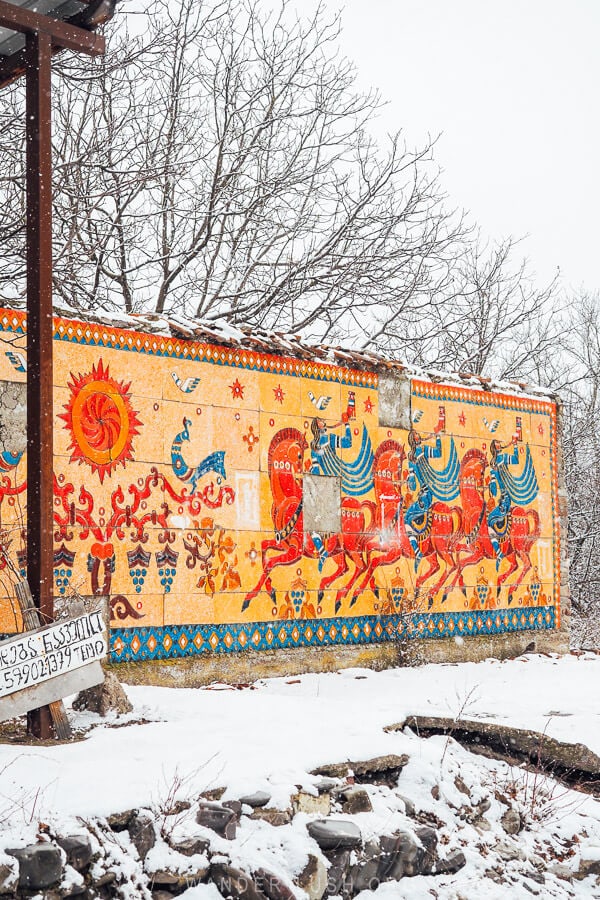 A Soviet-era mosaic panno depicting horses and lions on the Georgian Military Highway outside Tbilisi.