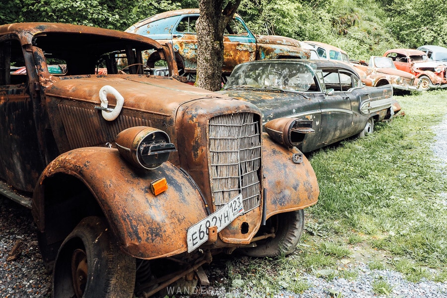 Vintage car junkyard in Pasanauri, Georgia on the Military Highway to Kazbegi.