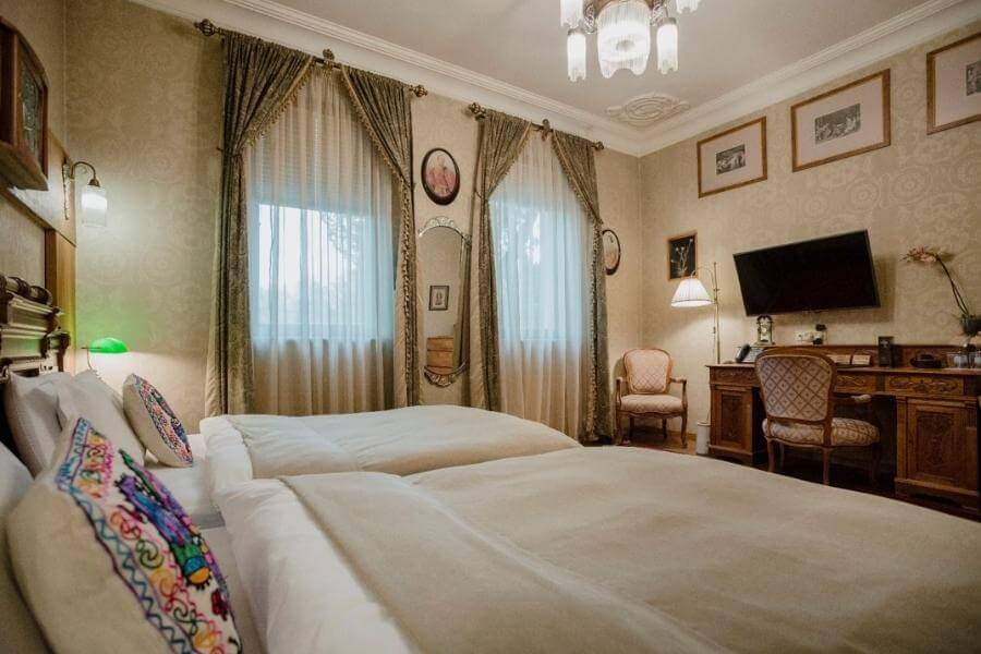 A Tbilisi boutique hotel room with old-world vintage furnishings.