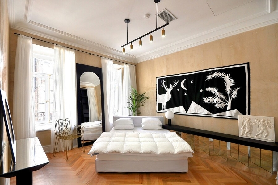 A beautiful hotel suite in Tbilisi with original artwork on the walls.