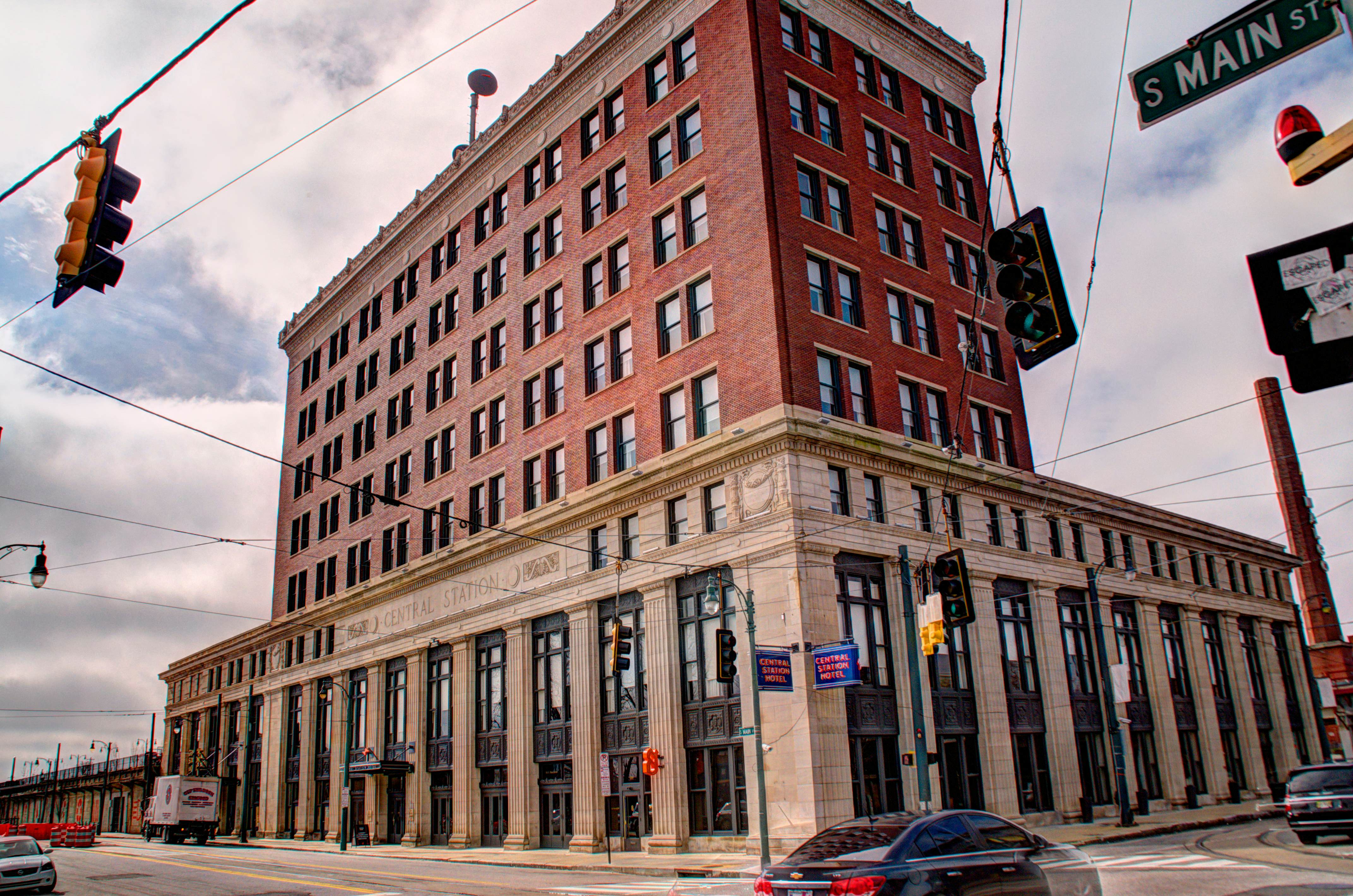 Exterior of a red-brick hotel building