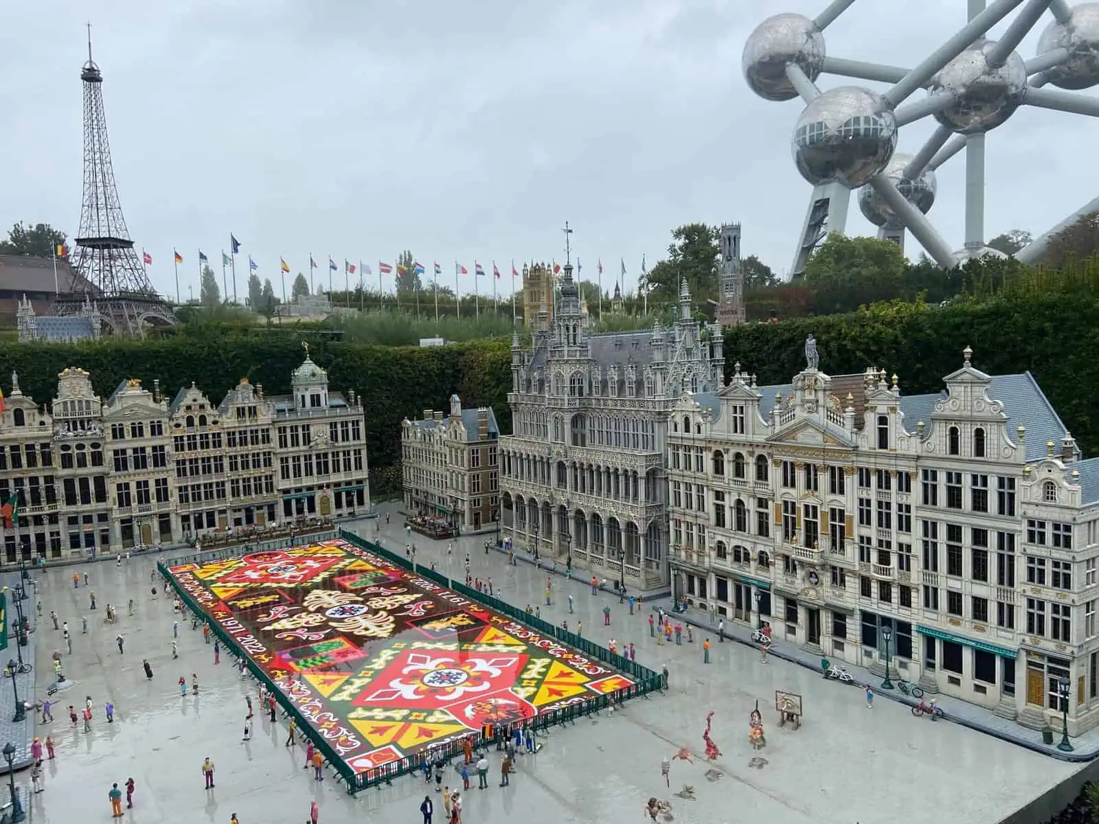 visiting Brussels Mini Europe Grand Place with the Eiffel Tower and Atomium in the background