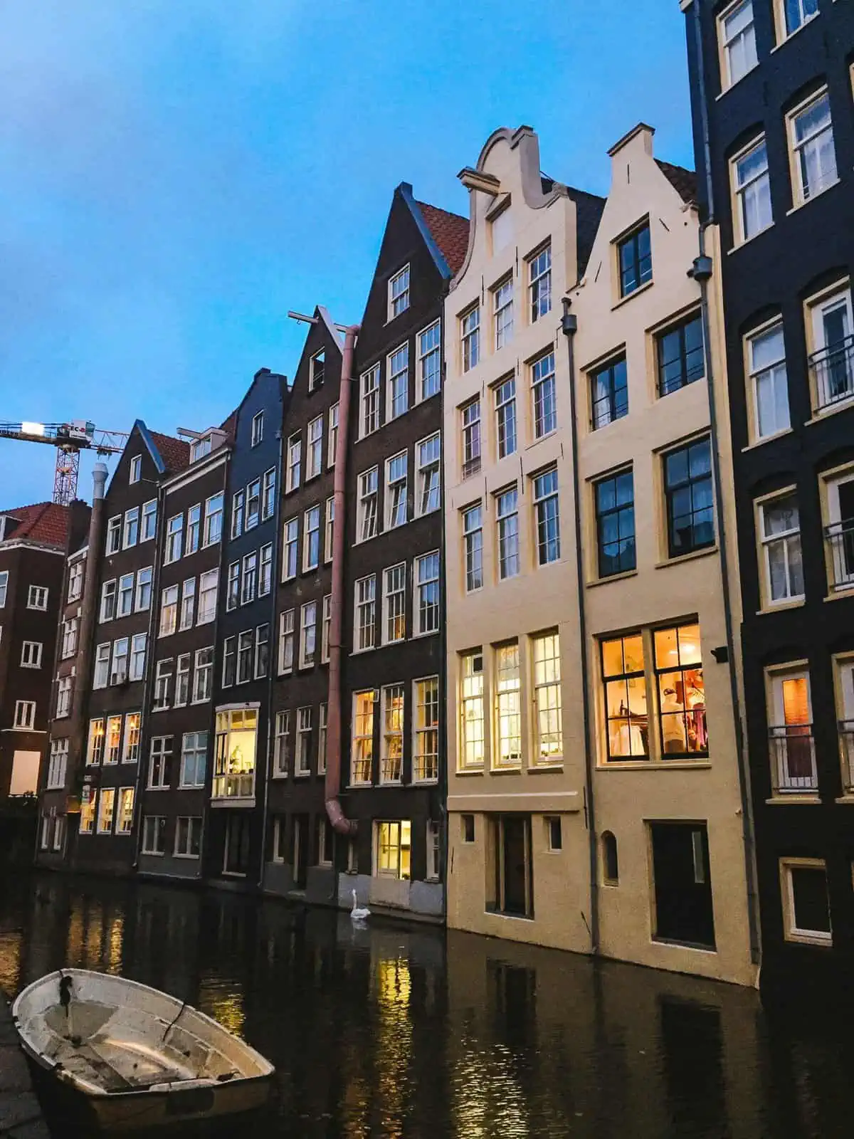 skinny houses on the canal near the Red Light District, 3 day Amsterdam itinerary