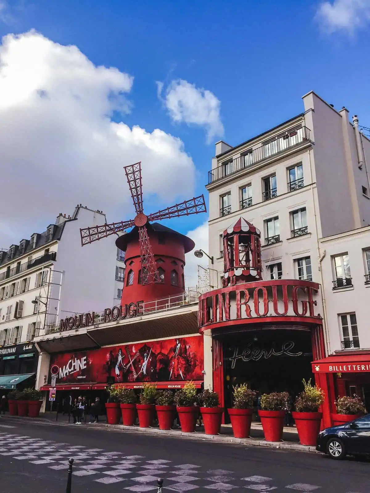 Entrance to the Moulin Rouge in Paris with it's iconic red windmill