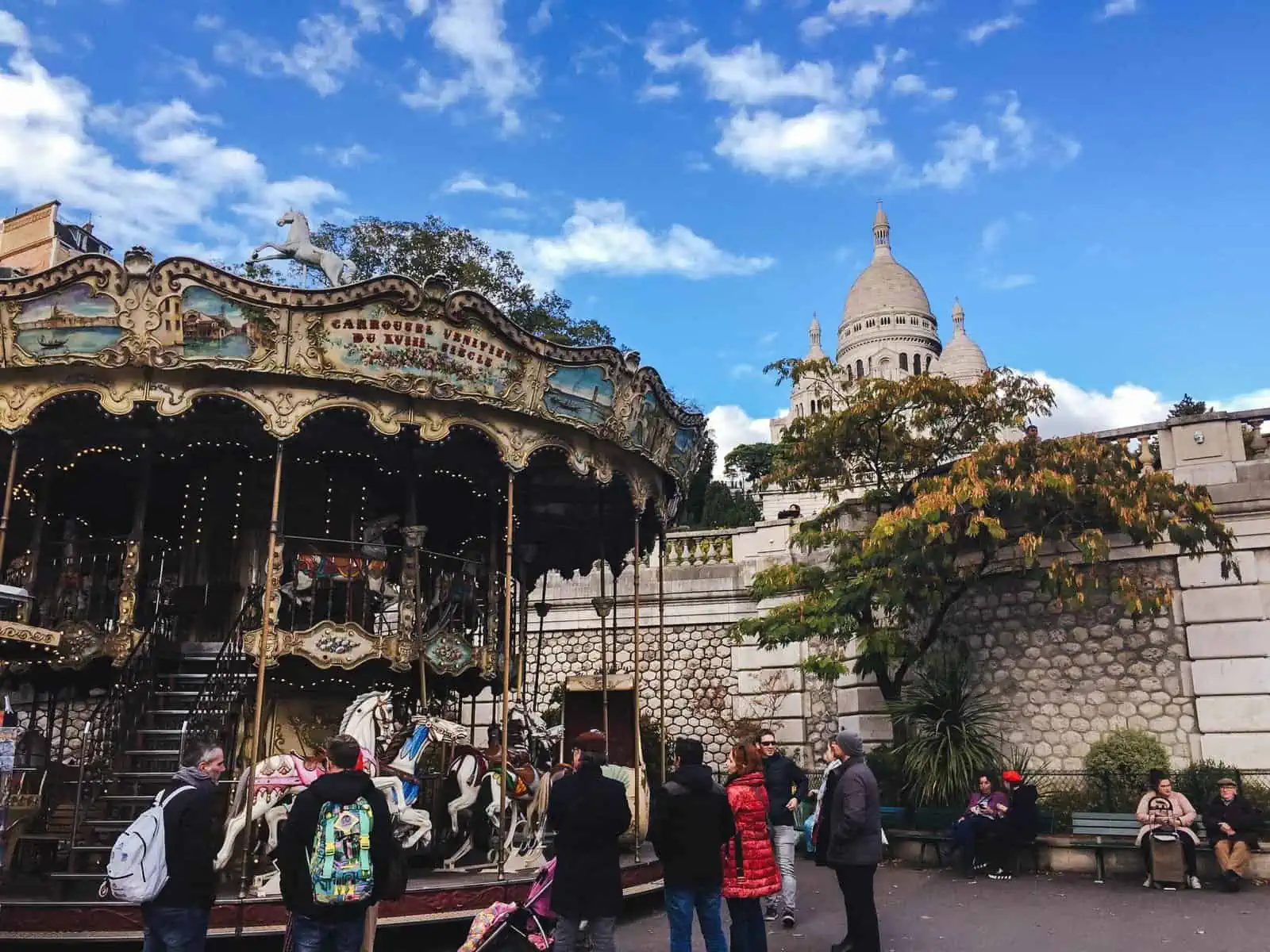 Carousel with Sacre Coeur in the background in Paris