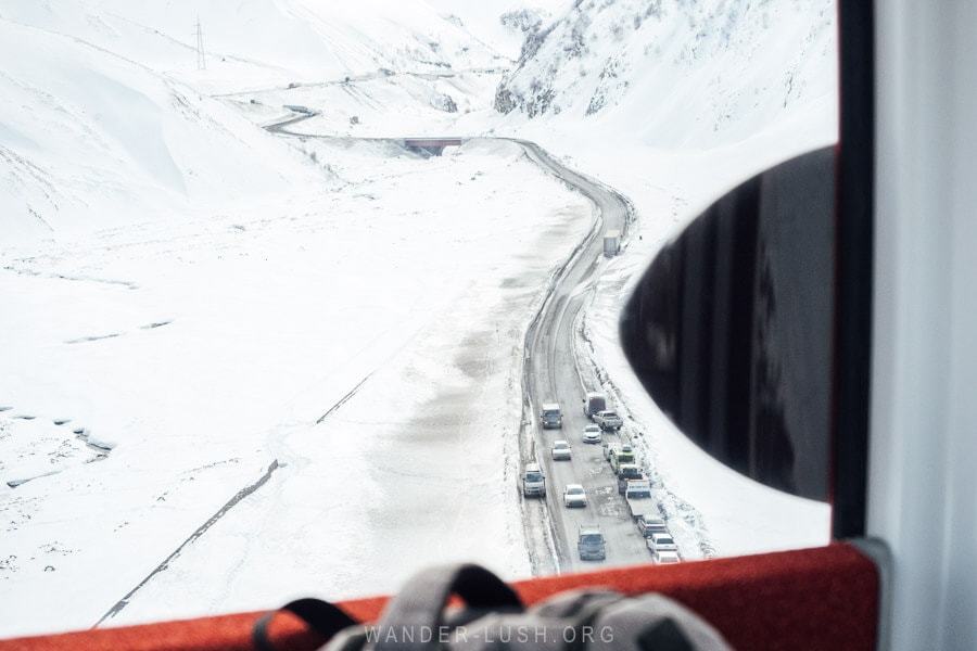 View of traffic on the Georgian Military Road from the window of the Kobi ski lift.