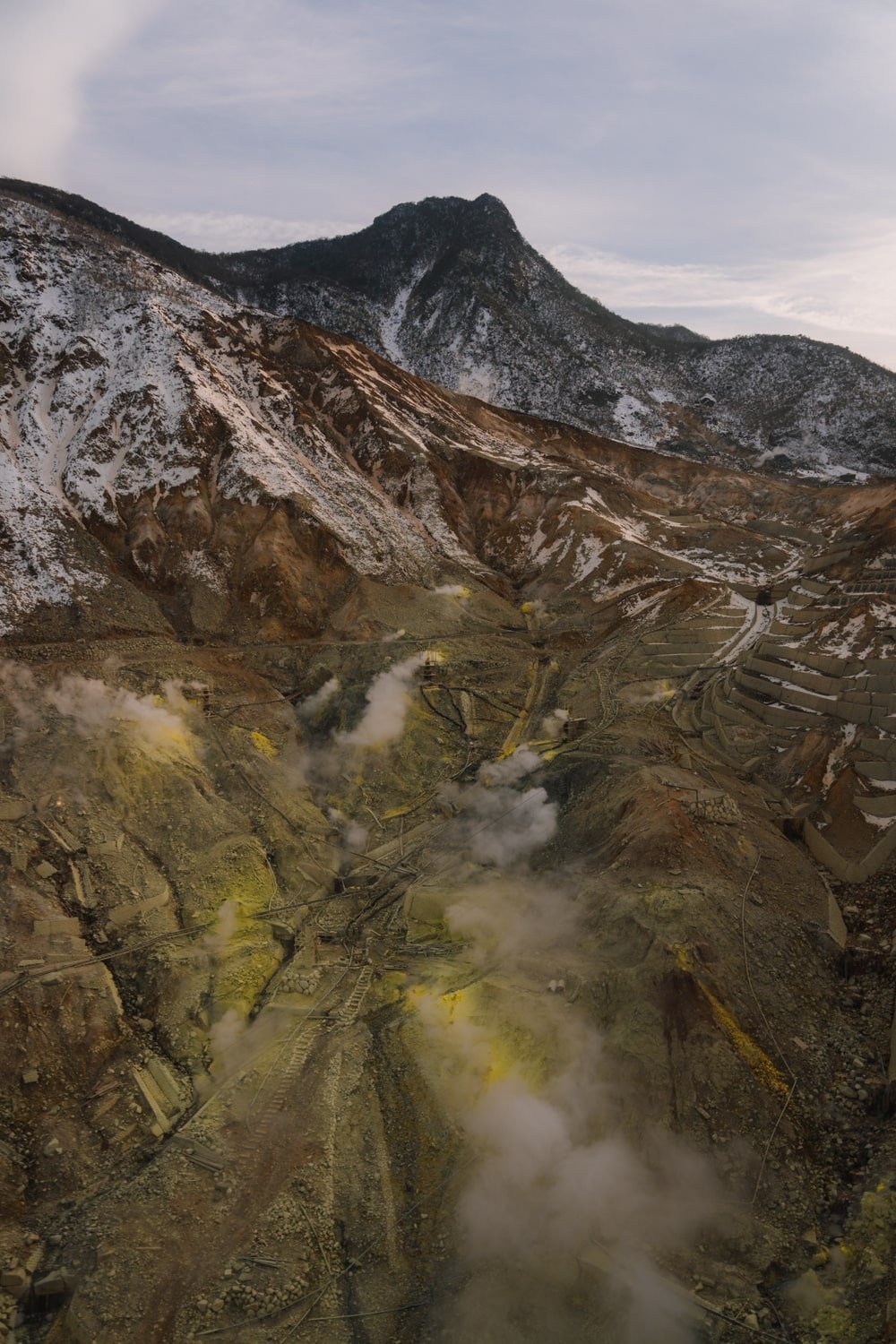 View from the Hakone Ropeway of the volcanic sulphur vents in the Owakudani sulphur fields in Hakone, Japan.