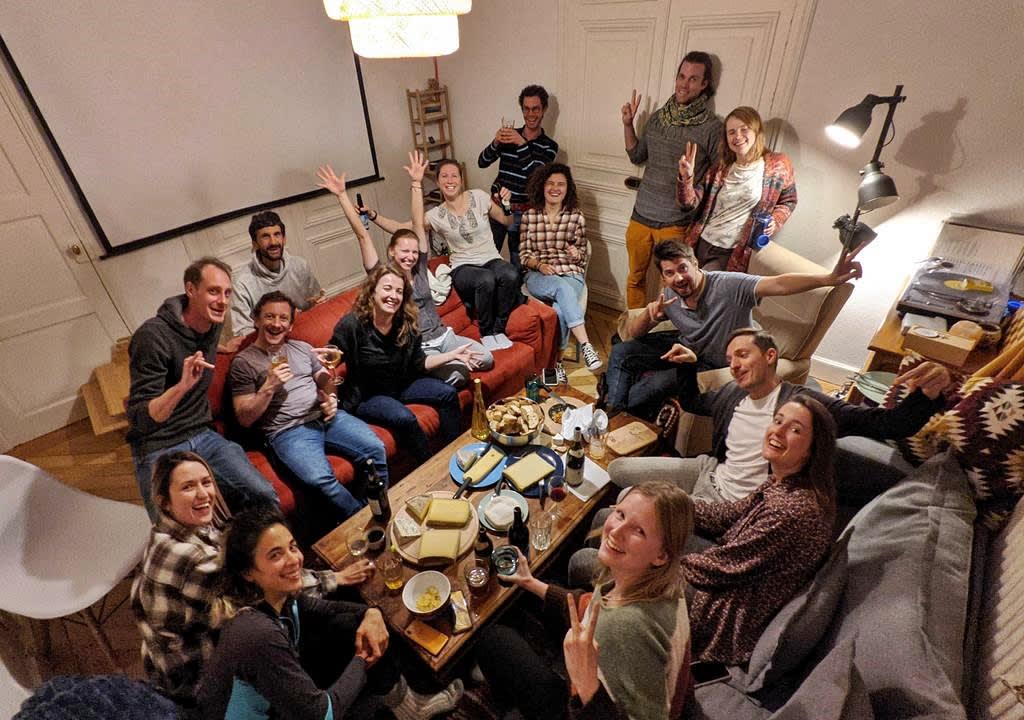 Group of people in a coliving posing for a photo