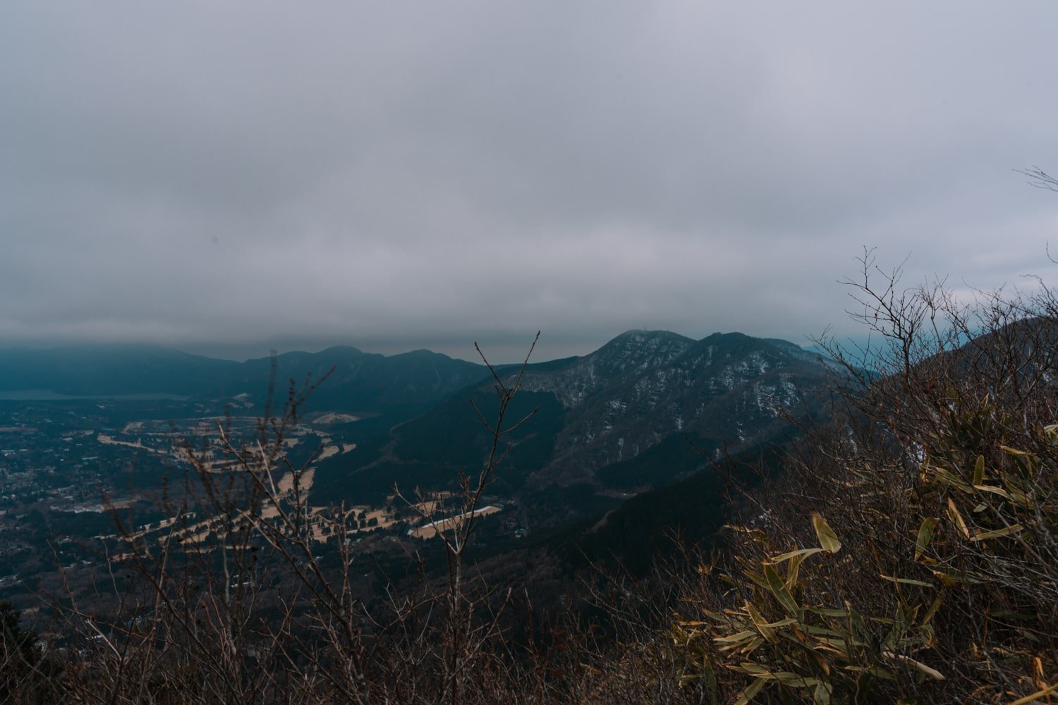 A cloudy view of the valley from the Mount Kintoki trail.