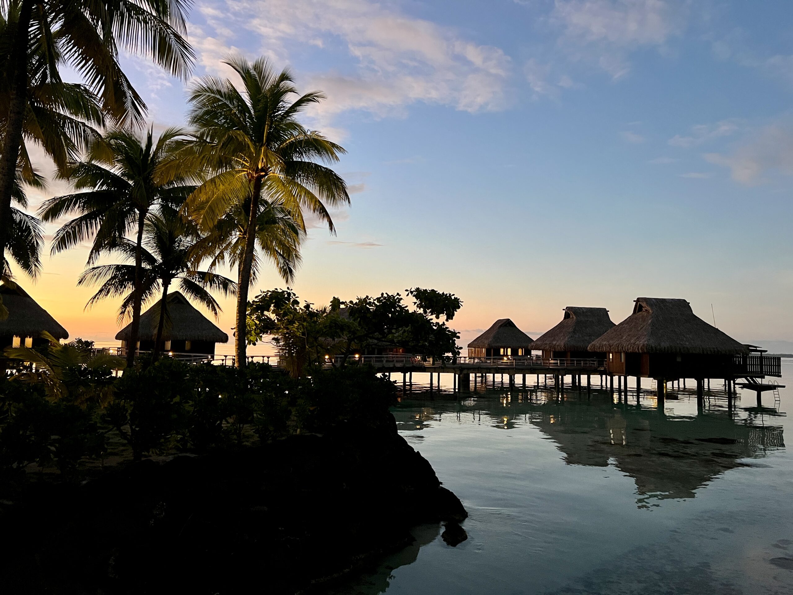 conrad bora bora nui villas at sunset