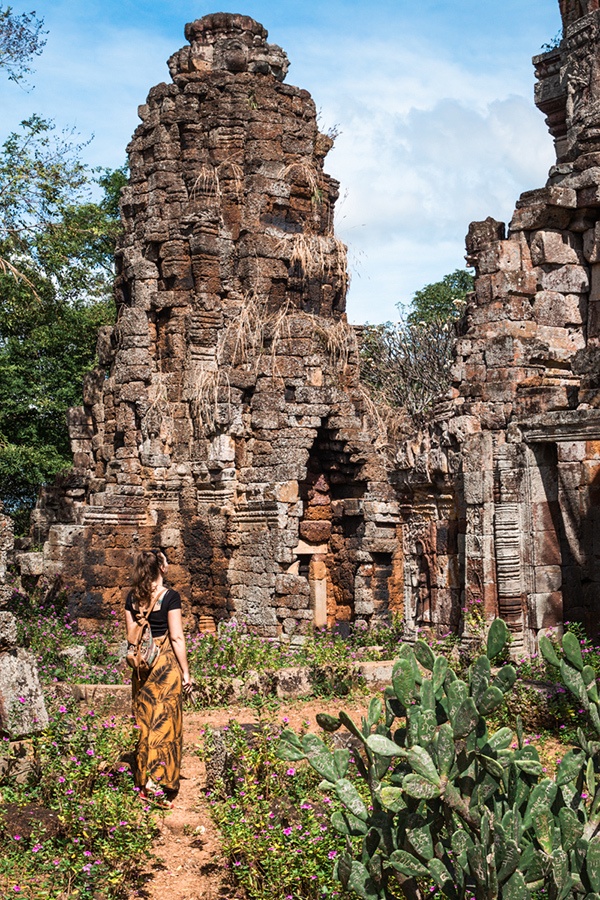 Visiting ruins during a backpacking trip in Asia.