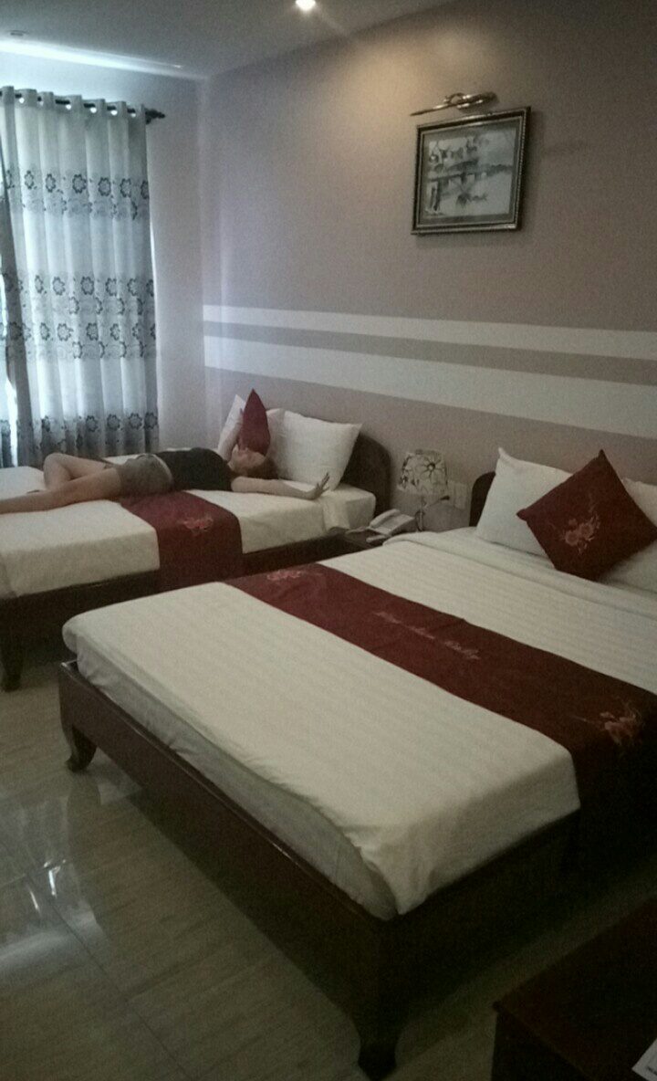 Room at the Hong Thien Ruby Hotel in Vietnam with two double beds