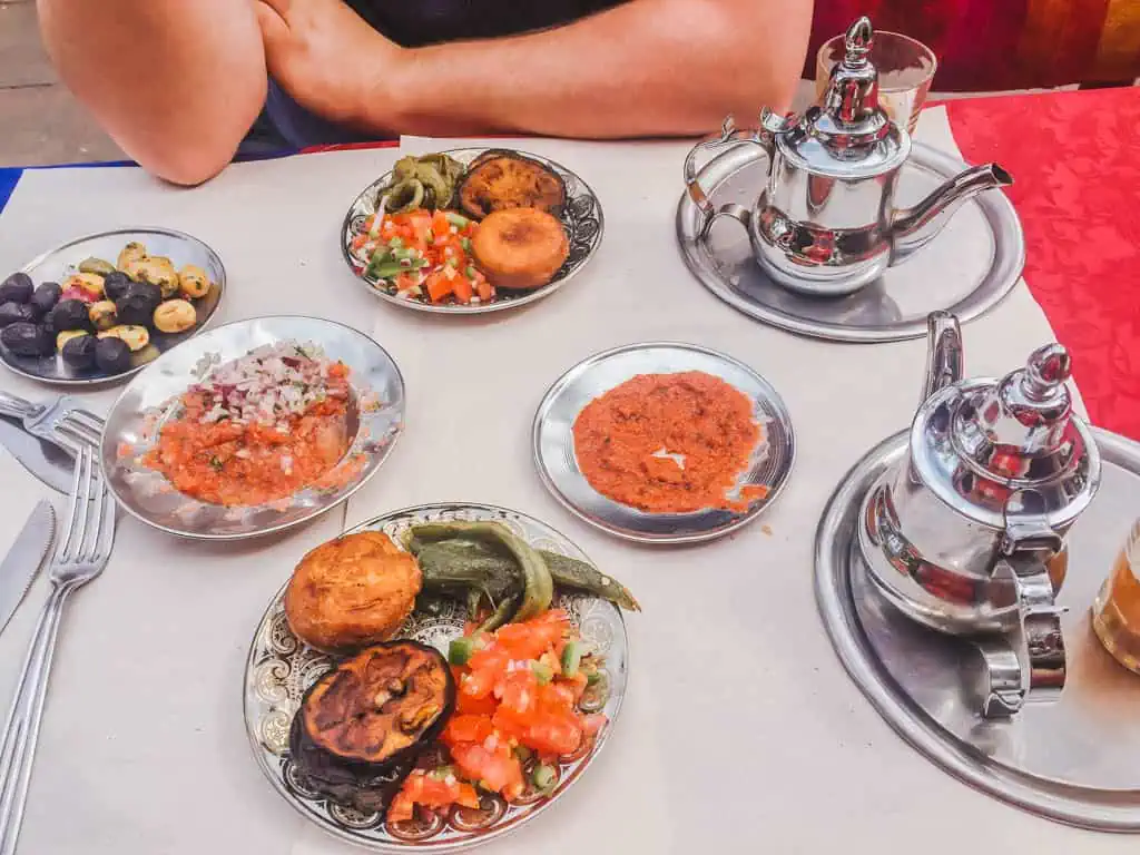 Moroccan snacks and tea on a table