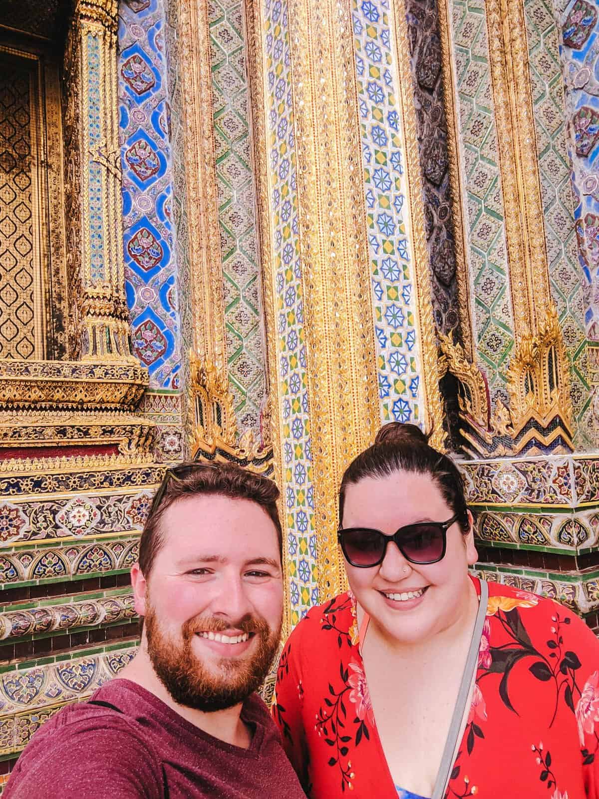 Selfie of Colin and Riana in front of a temple in Bangkok, Thailand