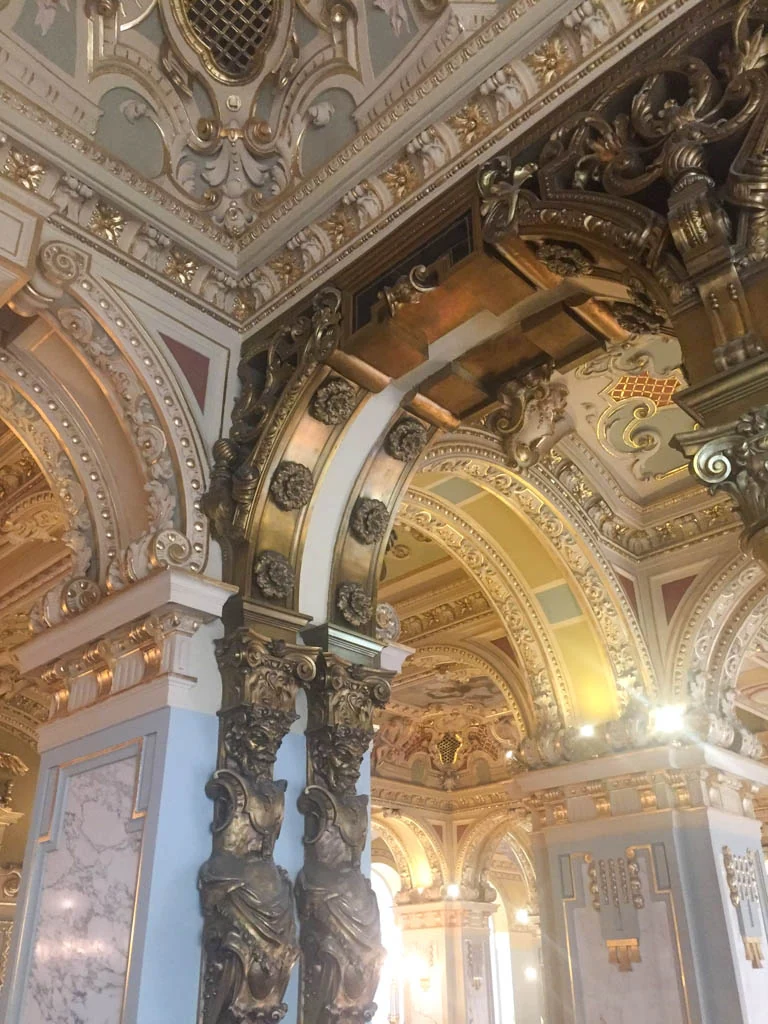 ceiling and golden arches at the Budapest New York Cafe