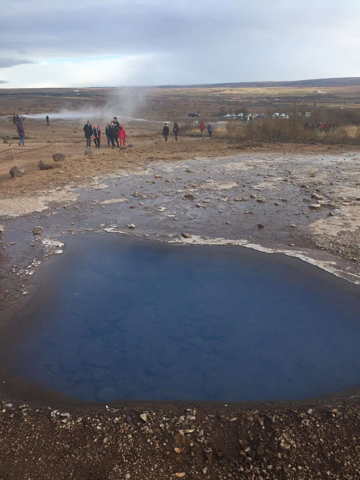 Walking along the path at Geysir Hot Springs in Iceland