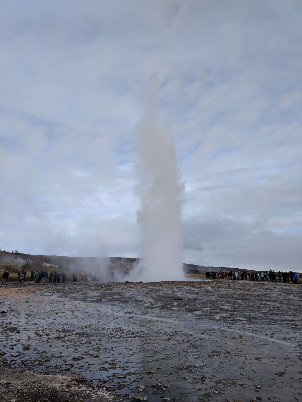 Strokkur geyser erupting at Geysir Golden Circle Iceland