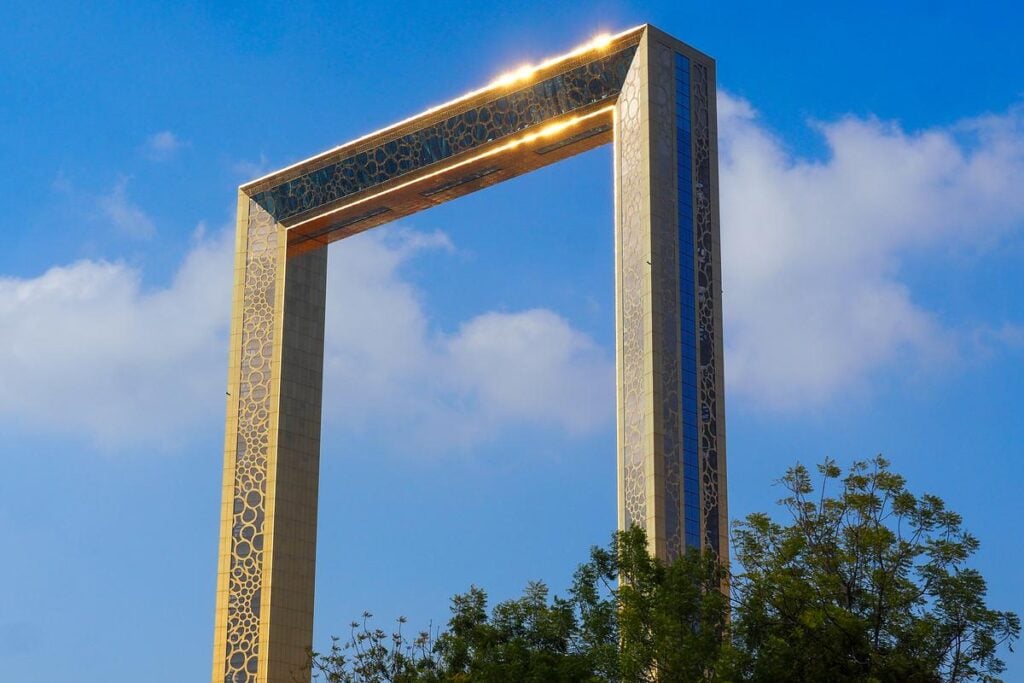 The Majestic Dubai Frame against a serene blue sky, showcasing modern architecture and cultural heritage.