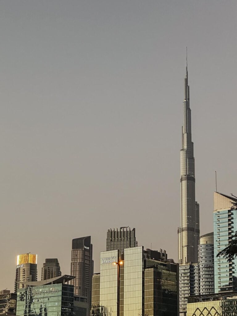 The golden-lit Dubai skyline featuring the iconic Burj Khalifa at twilight