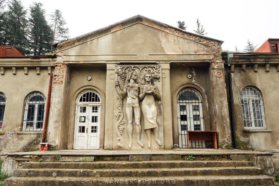 A former museum in Gurjaani with friezes of a man and woman surrounded by grapes.