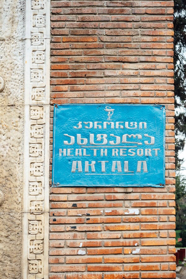 A sign for the Akhtala Health Resort, a balneological resort offering mud therapy in Gurjaani, Kakheti, Georgia.