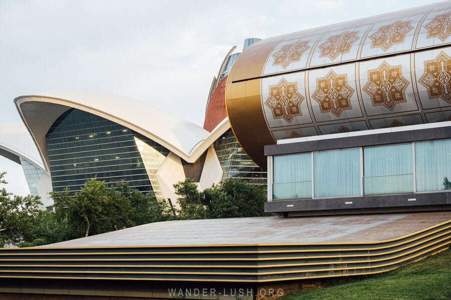 The Azerbaijan National Carpet Museum, a textile museum shaped like a rolled up carpet.