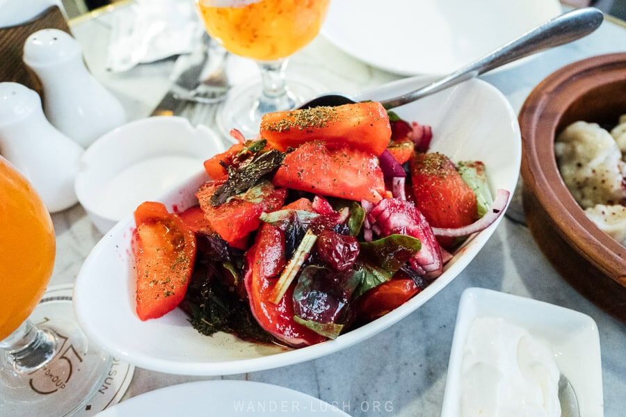 A colourful tomato salad with cherries served at Passage 145 in Baku.